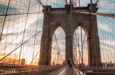 Brooklyn Bridge on the sunrise in the morning lights, New York, New York state, USA