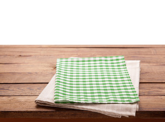 Tablecloth on wooden table isolated. Canvas, dish towels on kitchen top view mock up. Selective focus.