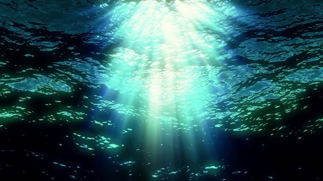 Underwater ocean waves ripple and flow with light rays (Loop).
