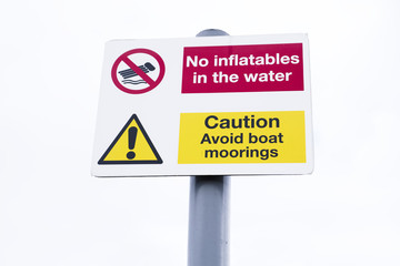 No inflatables in the water and avoid mooring sign post