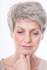 beautiful mature woman is thinking