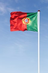 Flag of Portugal waving in the sky