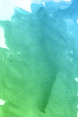 Blue and green watercolor paint background.