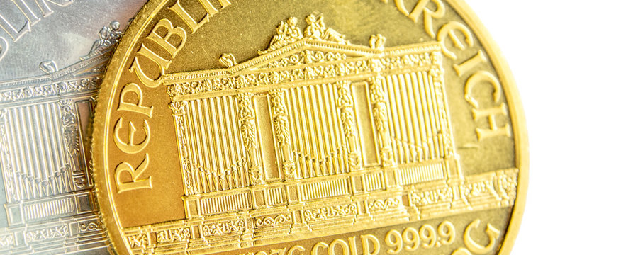 silver and golden austrian philharmoniker one ounce coins
