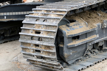 Continous Tracks on a Bulldozer, Raupenfahrzeug an einer Baustelle, Bagger