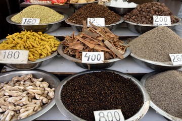 Assortment of fresh traditional Indian spices in the Khari Baoli spice market in Old Delhi, India