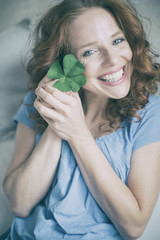 portrait of a young happy redhead woman