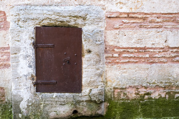 Stone Wall – Background Rustic Stone  Wall in a Old Construction.