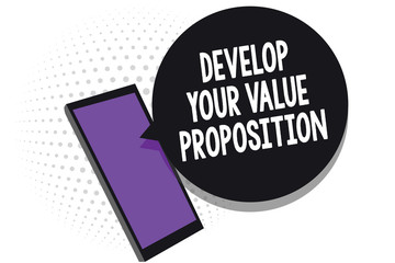 Writing note showing Develop Your Value Proposition. Business photo showcasing Prepare marketing strategy sales pitch Cell phone receiving text messages chat information using applications.