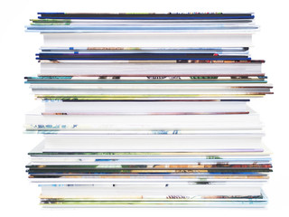 Stack of children's books on a white background.