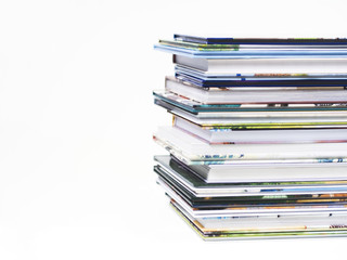 Stack of children's books on a white background.