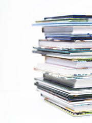 Stack of children's books on a white background.
