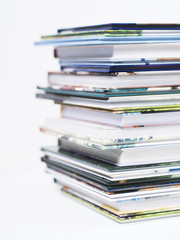 Stack of children's books on a white background.