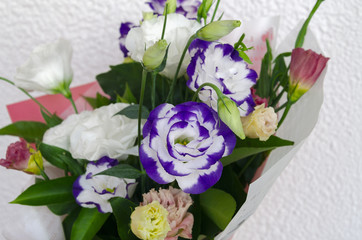Eustoma in a beautiful bouquet with other flowers for the holiday