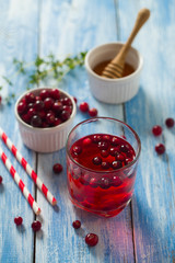 cranberry drink on wooden surface
