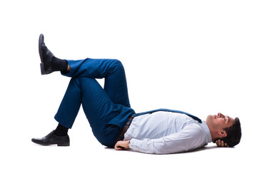 Businessman lying on the floor isolated on white