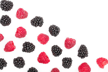 blackberry and raspberry isolated on white background. Top view with copy space for your text. Flat lay pattern