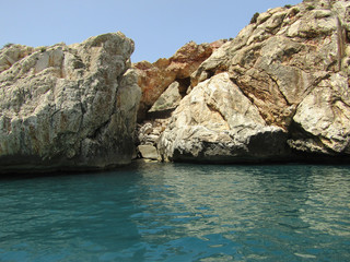 Jebha island and waves and rocks
