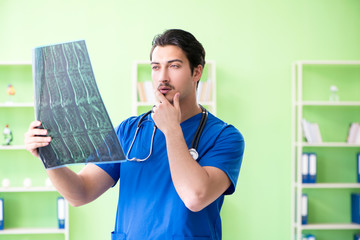 Young doctor working in the hospital