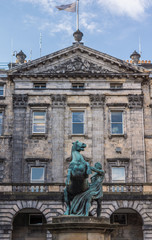 Edinburgh, Scotland, UK - June 13, 2012; Alexander and Bucephalus Statue outside City Chambers...