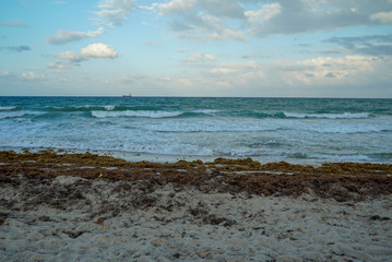 Breezy sunset with ocean waves at Fort Lauderdale Beach in Florida