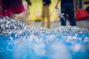 Small pieces crumpled aluminum foils focus on object