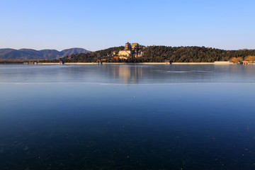Tower of Buddhist incense and frozen Kunming lake