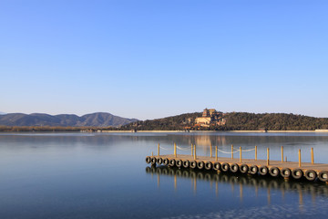 dock and the tower of Buddhist incense in Kunming Lake