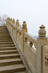 Fototapeta na wymiar Ancient bridge in Old summer palace ruins park, Beijing, China