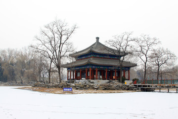 Pavilion building landscape in winter in Old summer palace ruins park, Beijing, China