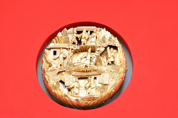 Exquisite jewelry on the red wall in the Mei Lanfang theatre, Beijing, china