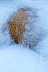 Fototapeta na wymiar rocks in ice and snow