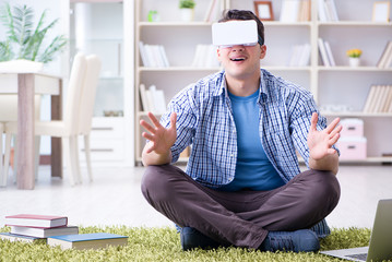 Freelance student with virtual reality glasses at home