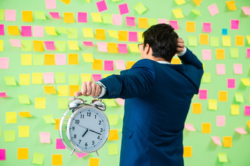Businessman with many business priorities