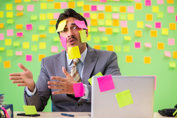 Businessman with many conflicting priorities   