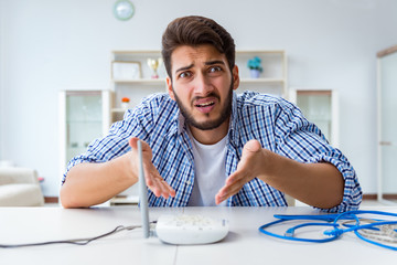 Frustrated young man due to weak internet reception
