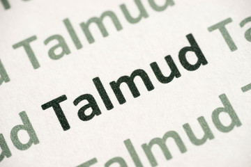 word Talmud printed on paper macro