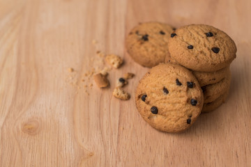 Chocolate chip cookies on wooden table