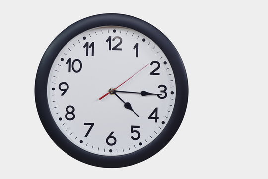 Time concept with black clock at quarter past four am or pm