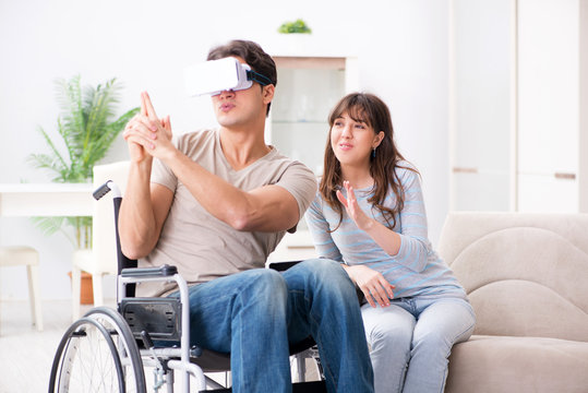 Disabled man with virtual glasses 