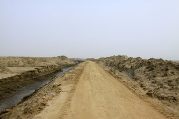 Dirt roads and drainage ditch
