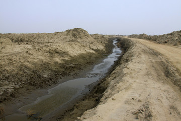 Dirt roads and drainage ditch