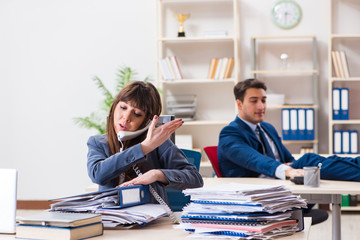 Male and female employees  in office