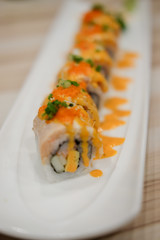 Spicy sushi salmon roll, Japanese cuisine
