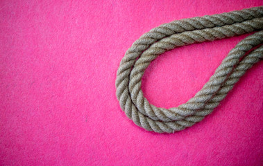 Rope on colorful pink background