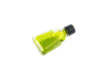 green liquid in glass bottles