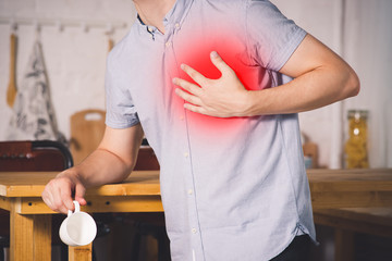 Heart attack, man with chest pain suffering at home