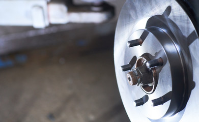Replacing the brake disc in a passenger car.