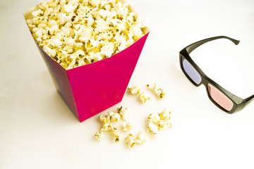 Cinema 3D glasses, popcorn on a white background