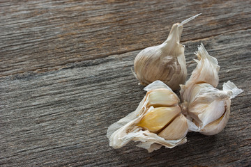 Garlic on old wooden floor